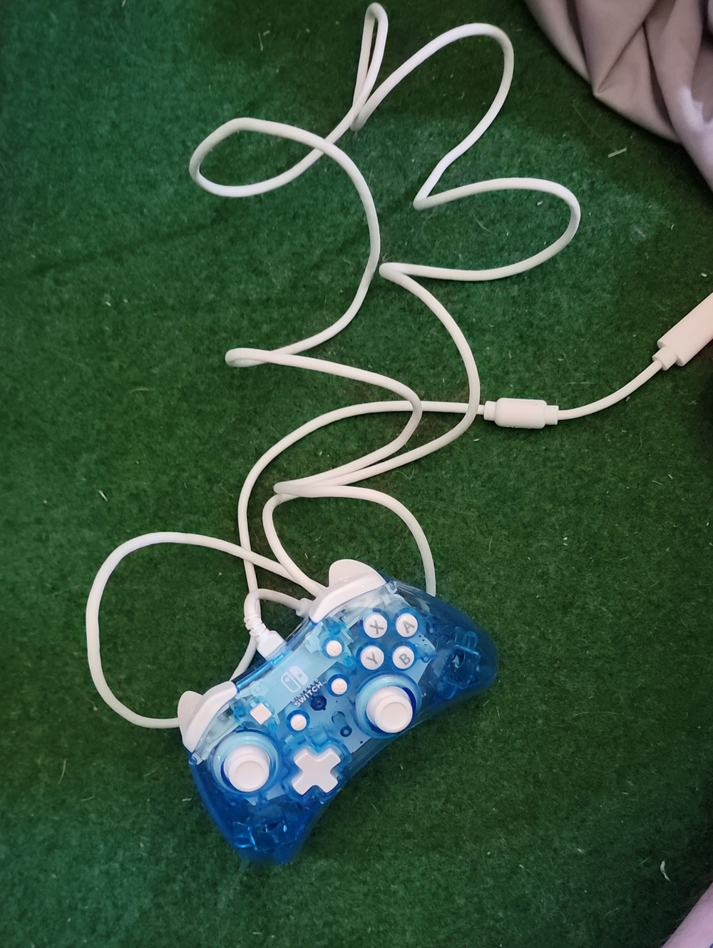 Transparent Blue Wired Game Controller with White Accents. Nintendo Switch